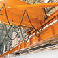 factory overhead crane on a yellow beam Close up 